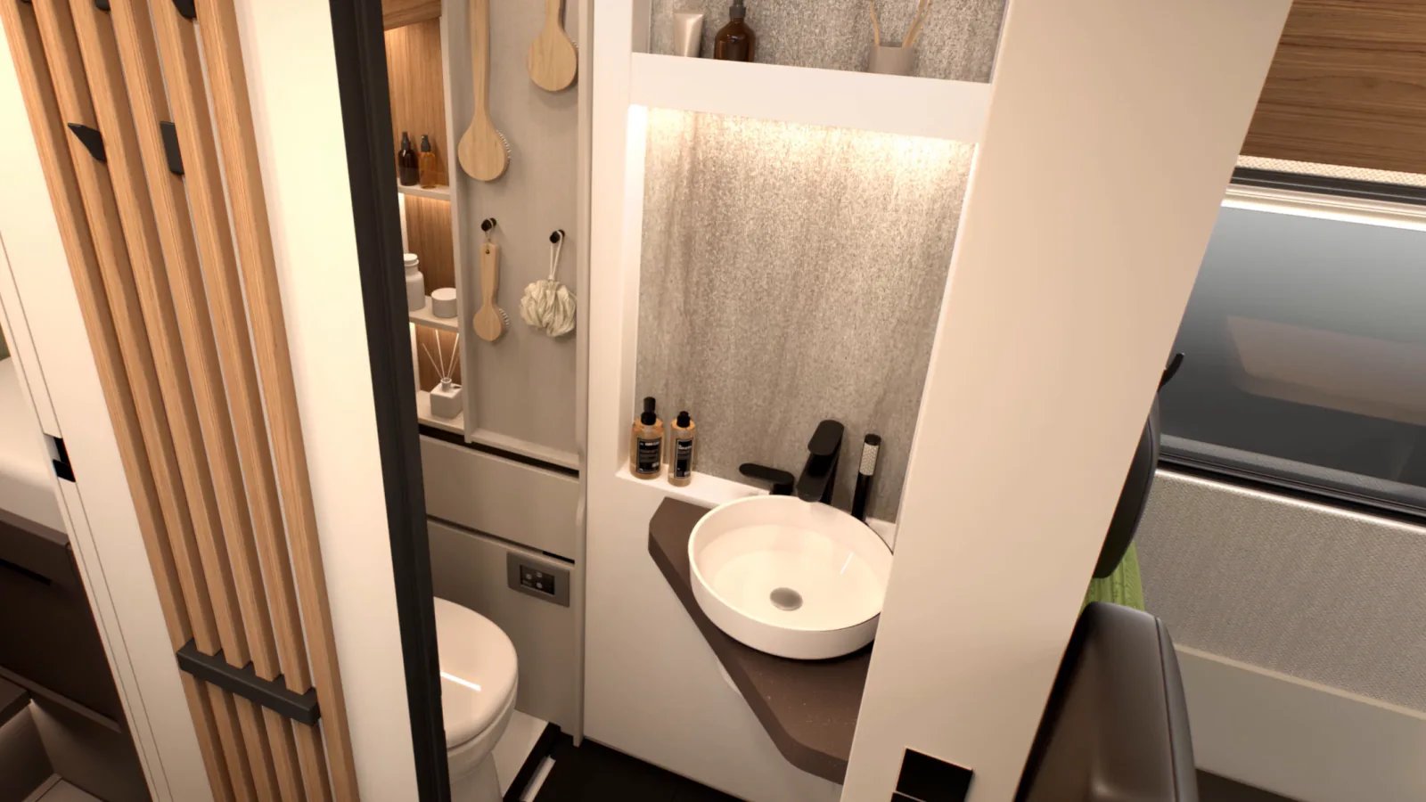 Bad im Bürstner Signature Mercedes als Waschraum: Waschtisch mit weißem Aufsatzbecken, schwarze Armatur, rechts daneben die Toilette